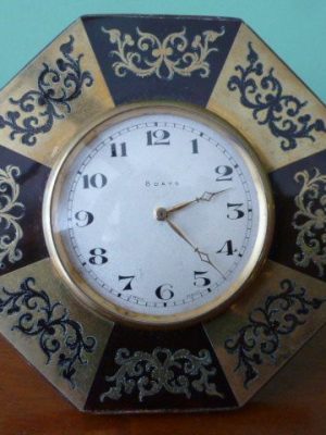 An unusual fine Brass and Rosewood Strut Clock