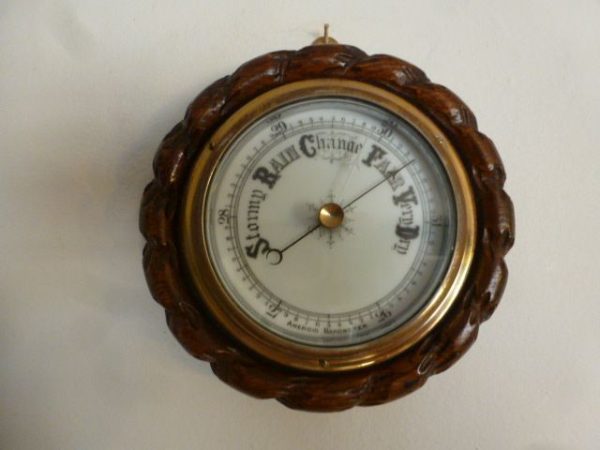 A Miniature Rope Edged Oak Cased Aneroid Barometer
