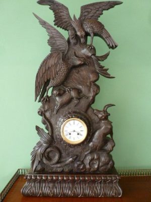 An Impressive Carved Black Forest Table Clock